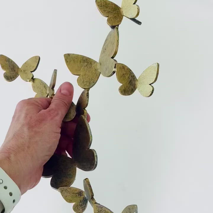 Load video: Butterfly Wall Sculpture video showing detail of individual forged butterflies