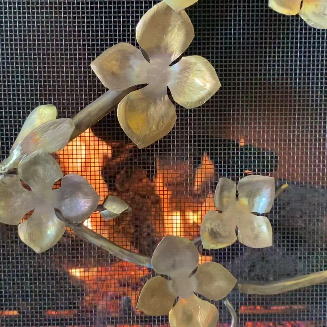 Load video: Sakura Fireplace Screen video showing detail image of Sakura Fireplace Screen